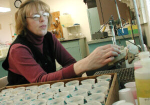 researcher testing materials