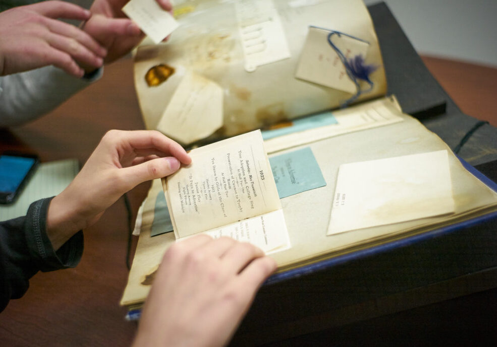 Photo of people writing archives